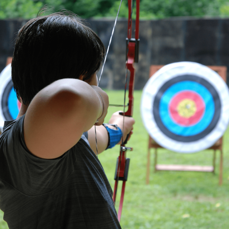 A person using a bow at Country Pursuits