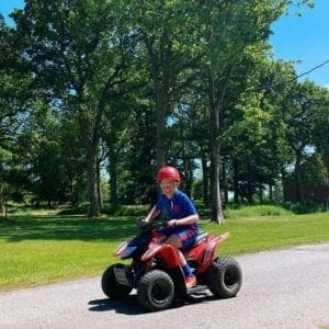 A child on a small quad bike