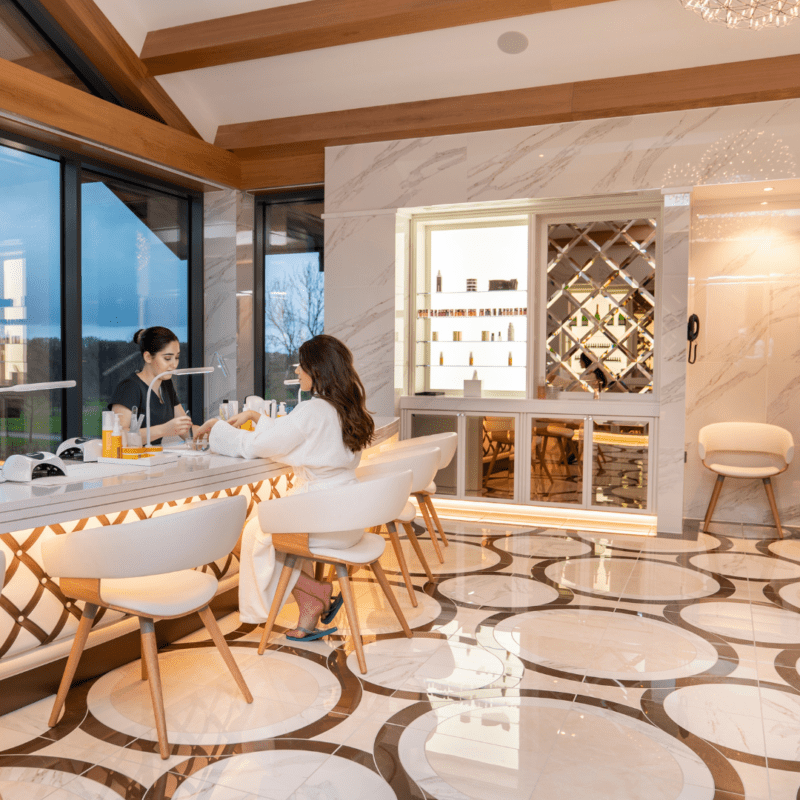 A woman getting her nails done at Carden Park Spa